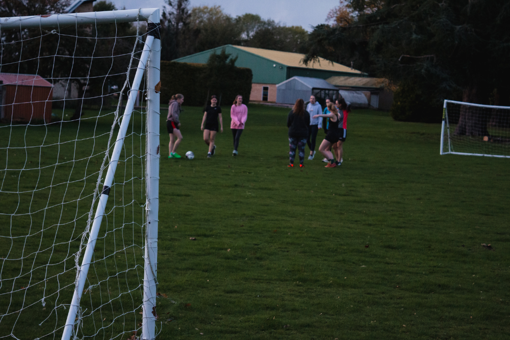 2 Students undertaking a boot camp in the campus grounds