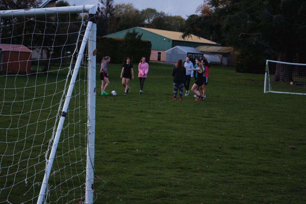 Students undertaking a boot camp in the campus grounds